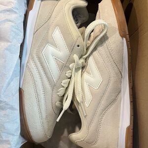 New Balance Women’s Cream and White Sneakers